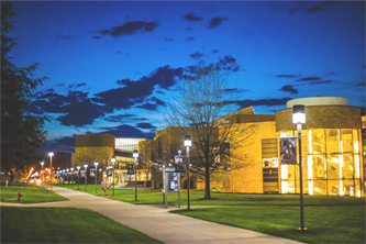 Photo of campus buildings in the evening